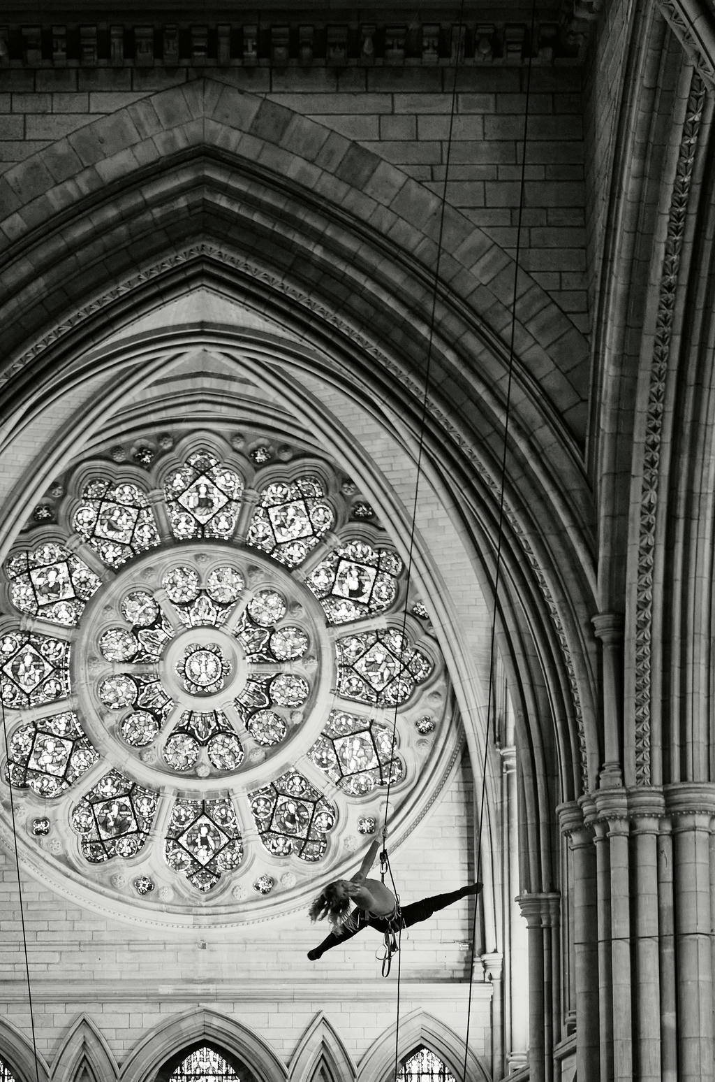 Georgie Barnett from Yskynna Vertical Dance Company warming up at rehearsal in Truro Cathedral